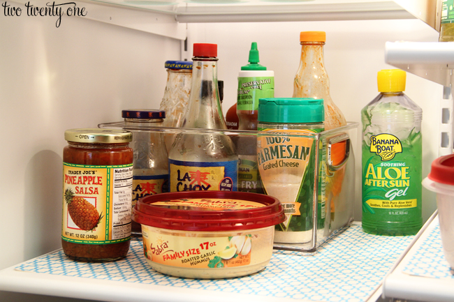 organizing condiments in fridge