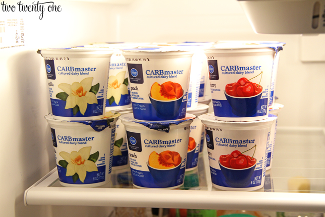 organizing yogurt in fridge