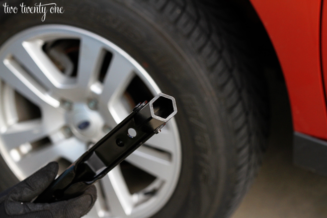 using a lug nut wrench