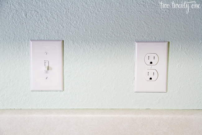 white electric outlet and switch