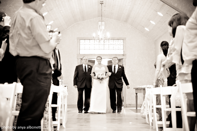 bride with two dads walking down aisle