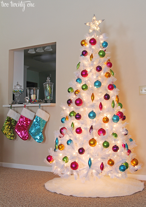 White Christmas tree with jewel tone ornaments