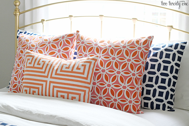 coral and navy pillows