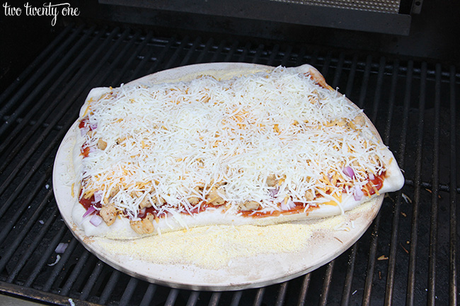 BBQ chicken pizza on the grill