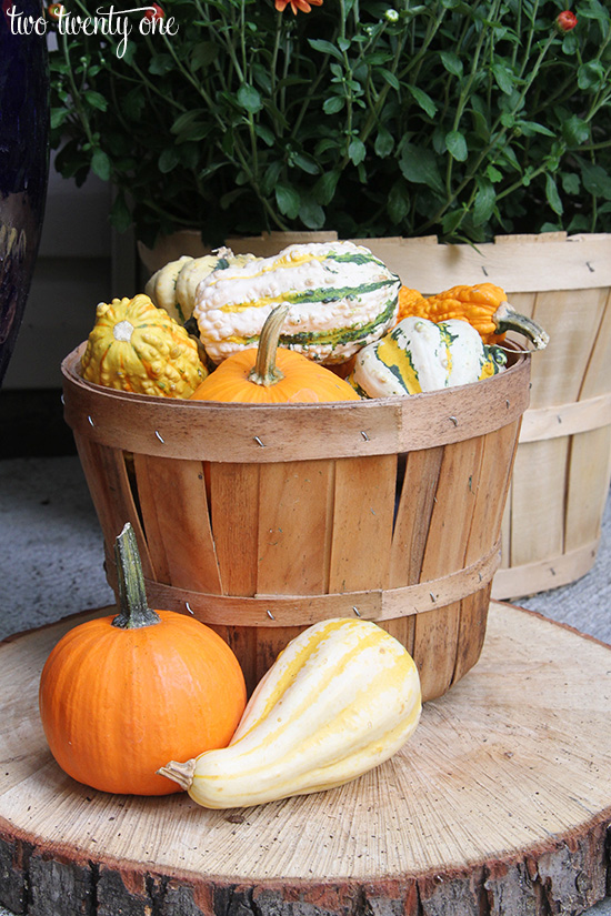 apple basket with gourds