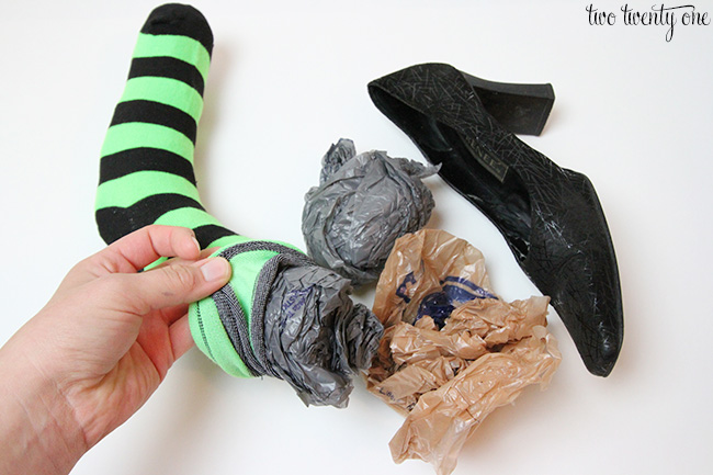stuffing witch socks with plastic bags