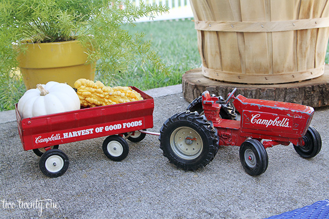 toy tractor and gourds