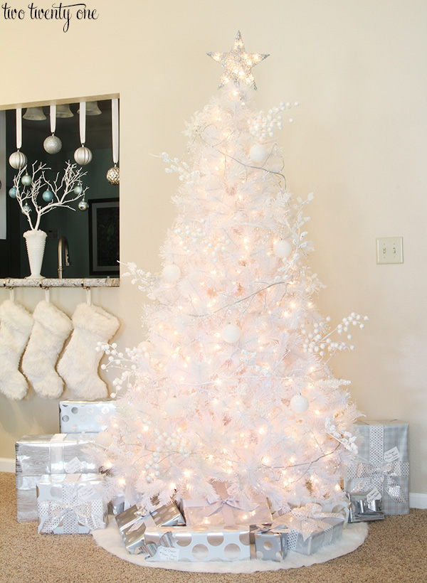 White Christmas tree with white and silver decorations