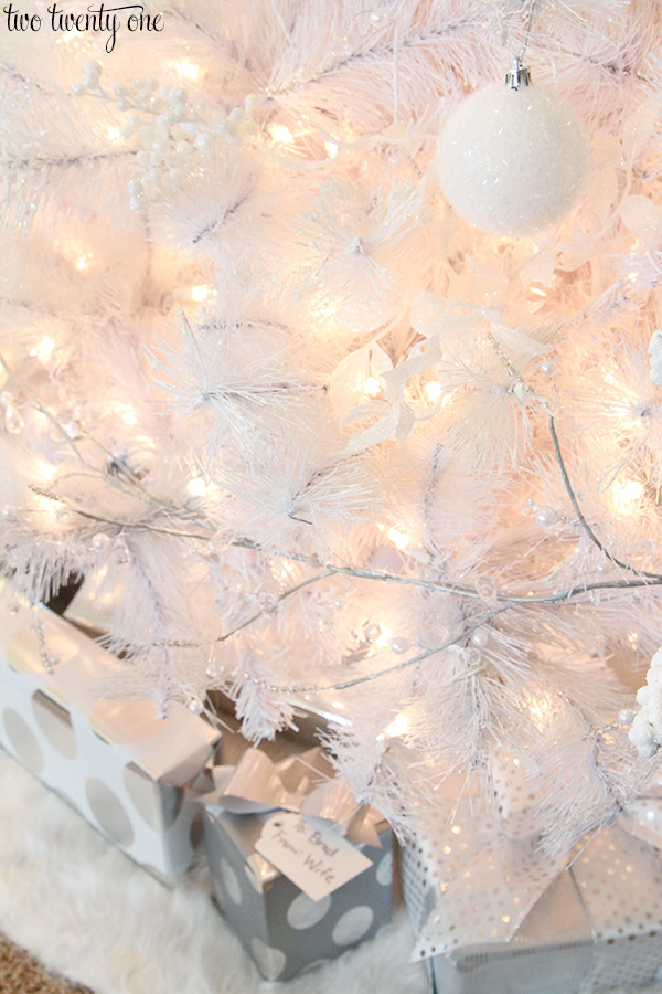 White Christmas tree with white and silver decorations