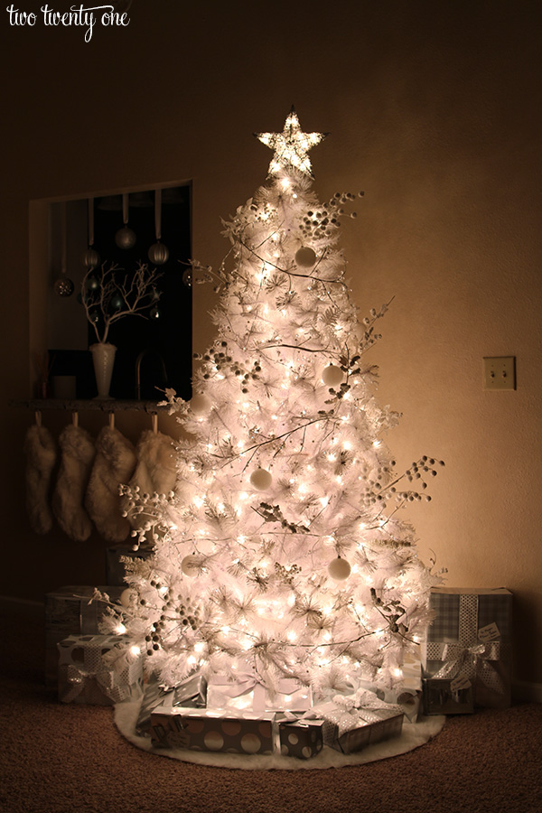 White Christmas tree with white and silver decorations