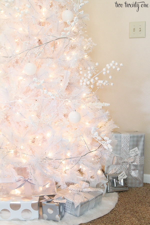 White Christmas tree with white and silver decorations