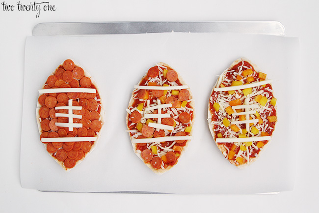 pita pizzas shaped like footballs