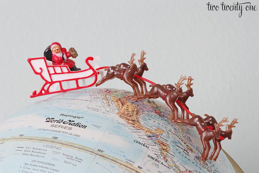 santa-and-reindeer-on-globe