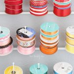 Home office / craft room update. How to store and neatly organize ribbon. Tip for storing gift wrap paper, and where to buy quality wrapping paper.