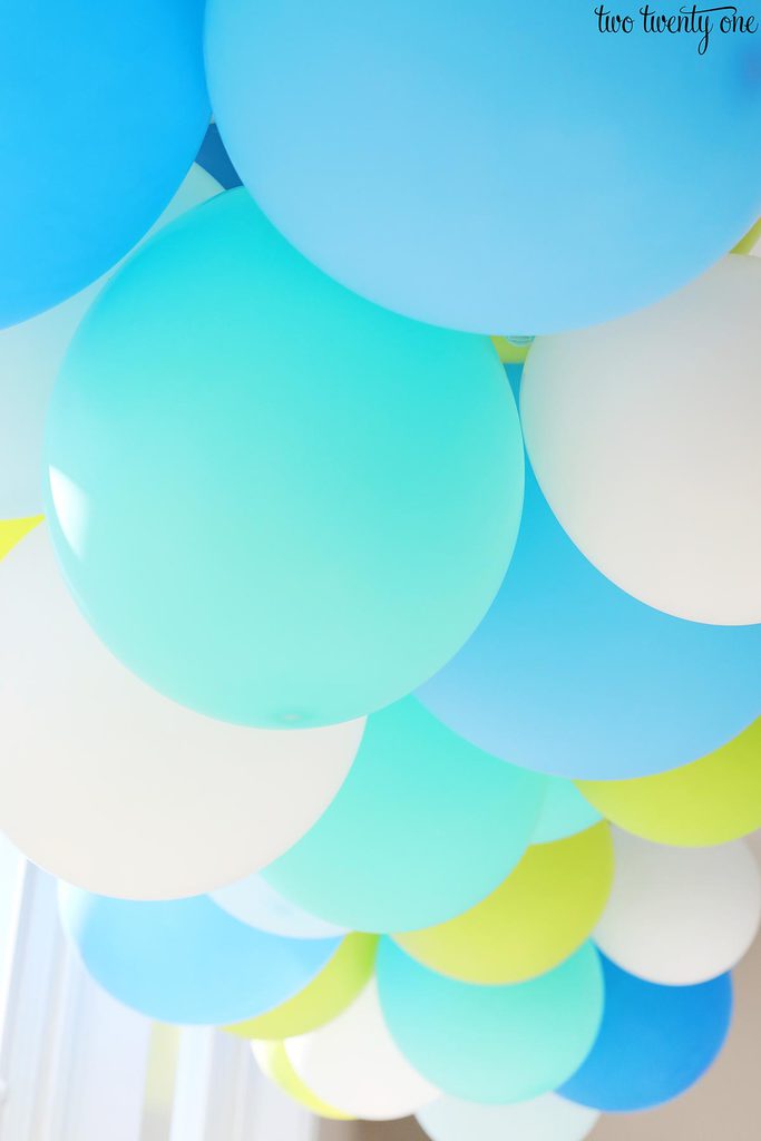 blue green white balloons