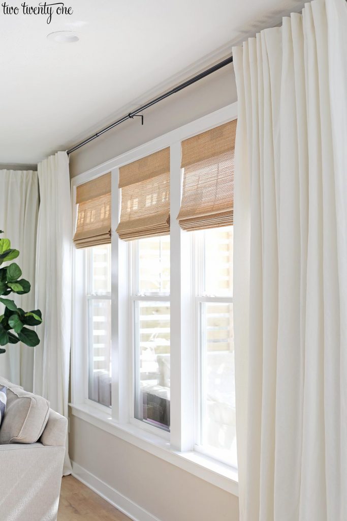 natural bamboo shades with white linen cotton curtains