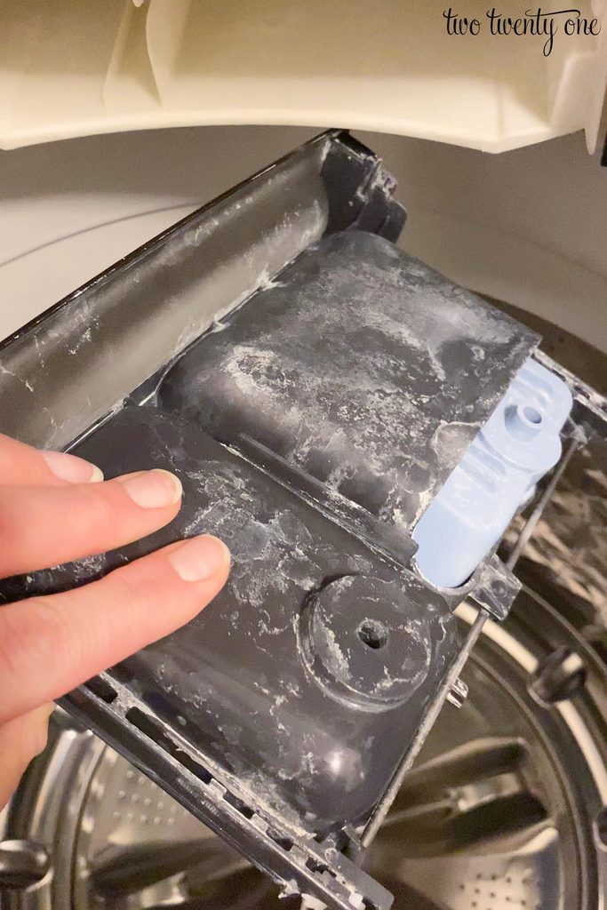 dirty washing machine detergent tray