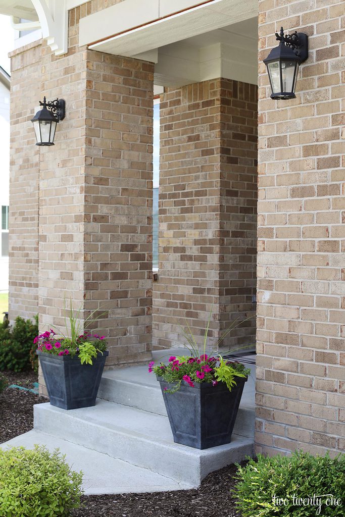 planters on front porch steps