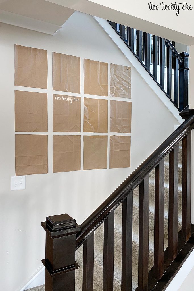 How to arrange photos on sale on staircase walls