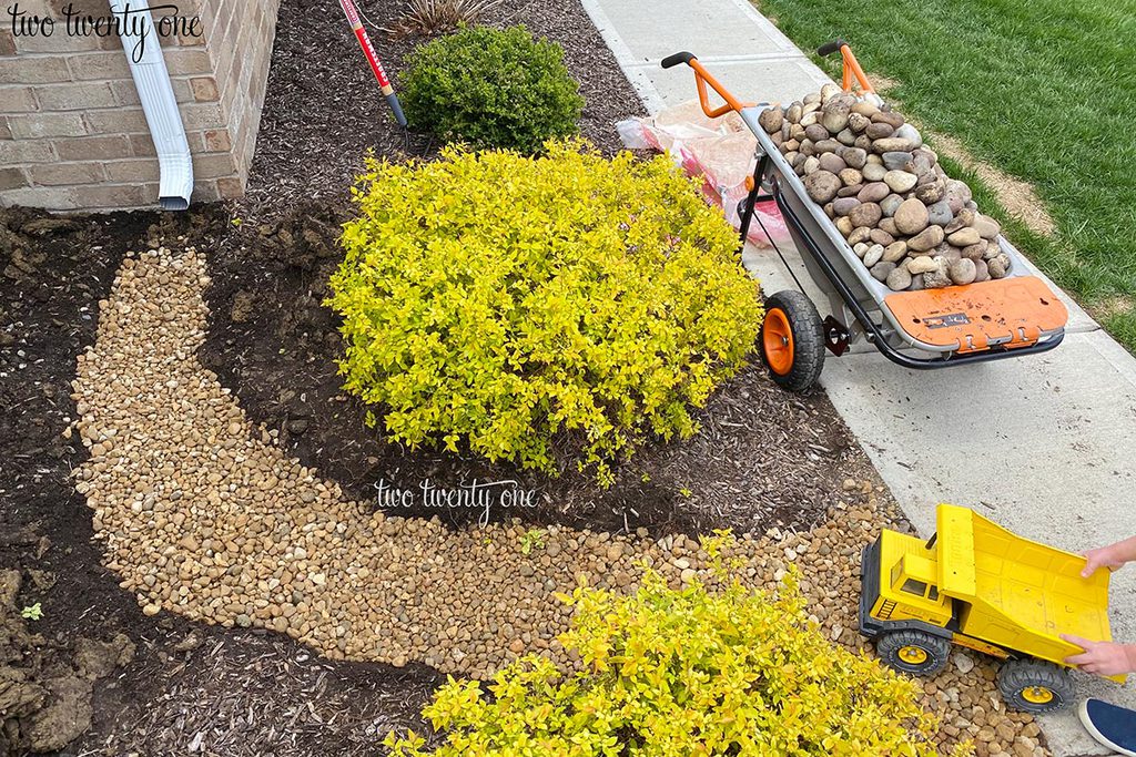 adding gravel to dry creek bed