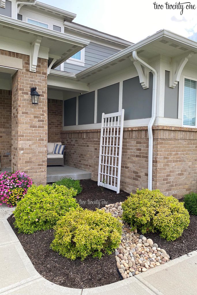 dry stream bed in front yard landscaping