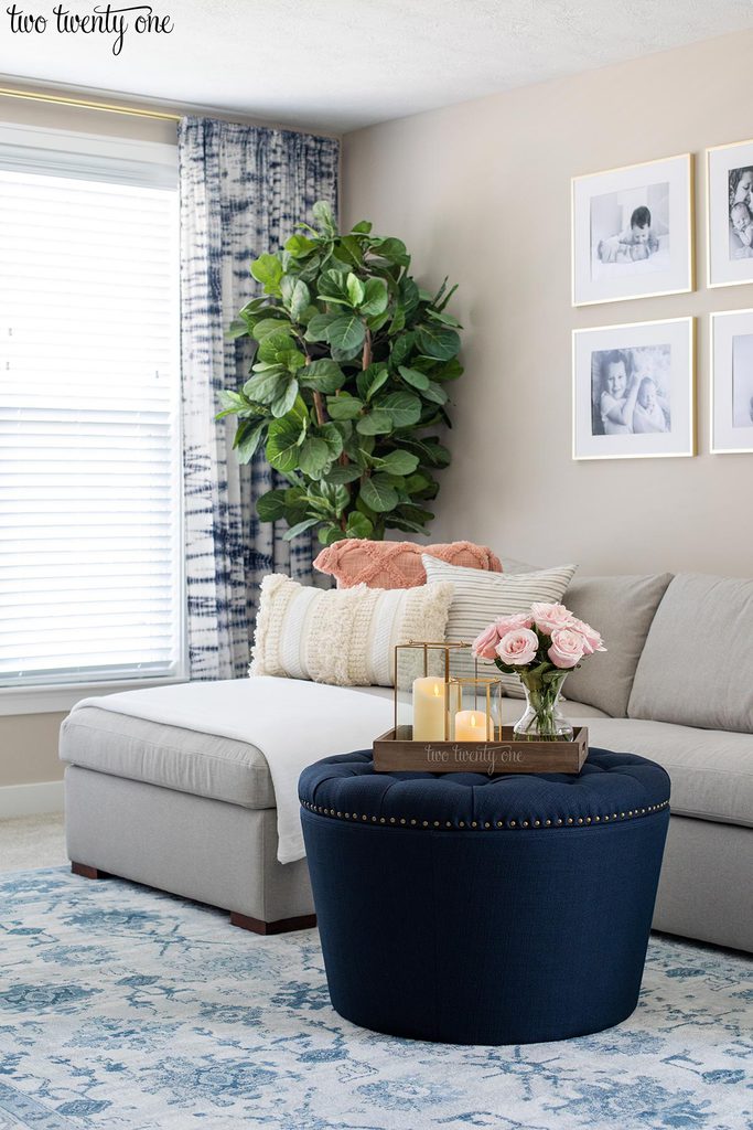 gray couch with chaise, navy ottoman, shibori curtains, with fiddle leaf fig tree in front