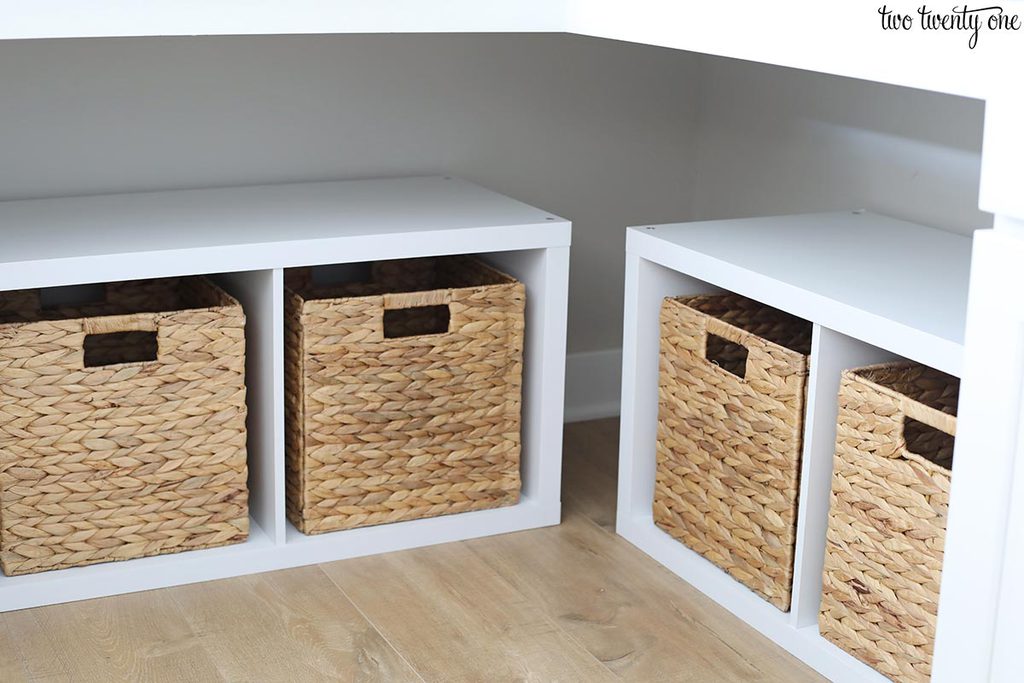 Cube storage shelves with 4 cubes. Hyacinth storage baskets in each cube.