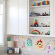 Homework area with wall cabinets and a built-in desk area.