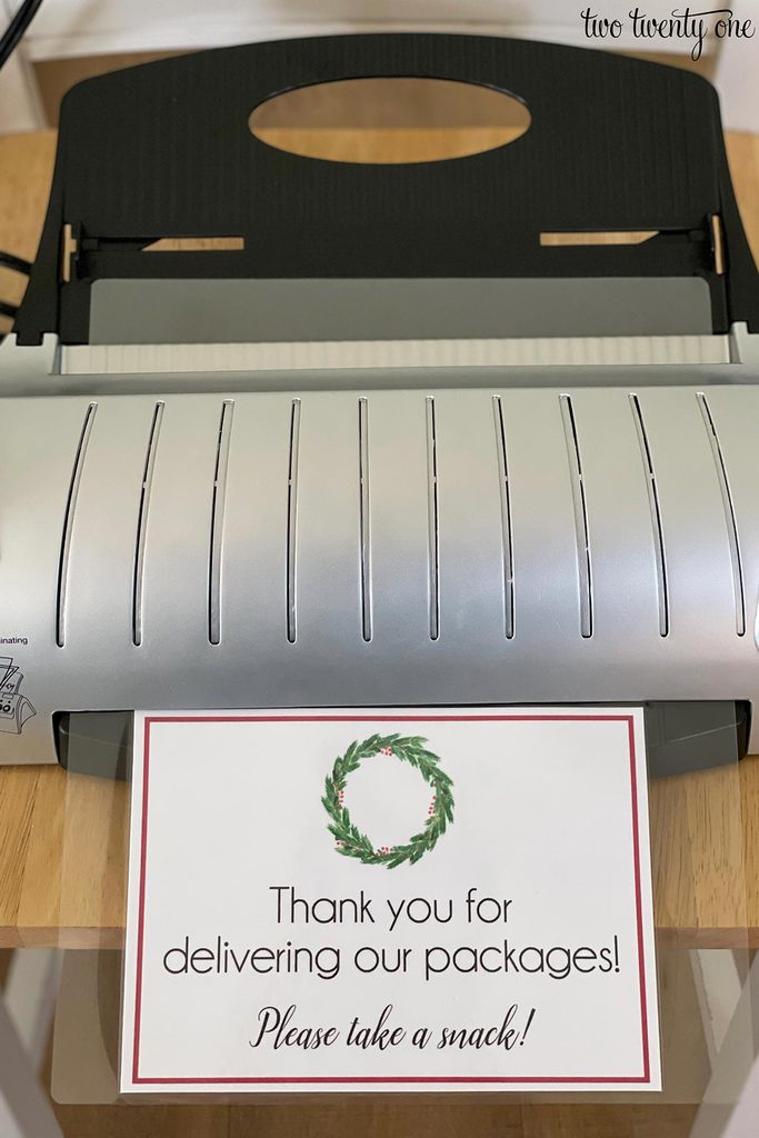 laminating a thank you sign