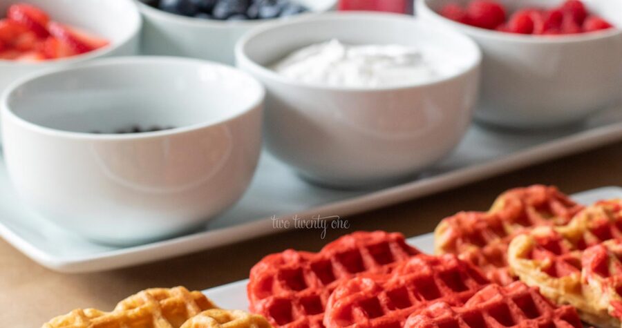 heart shaped waffles on a white platter for Valentine's Day brunch