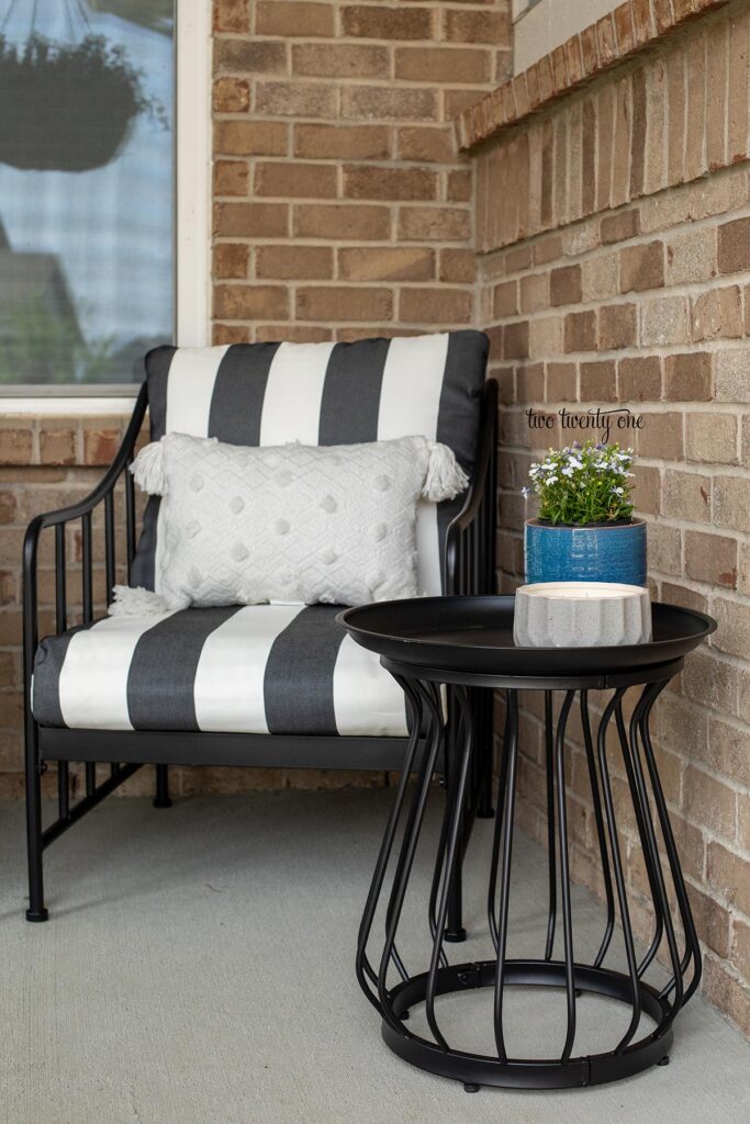 black and white patio furniture chair and black side table