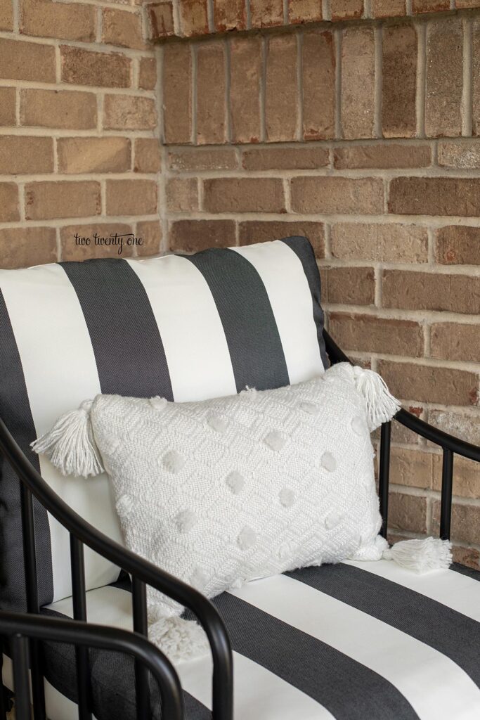 black and white patio furniture with white pillow