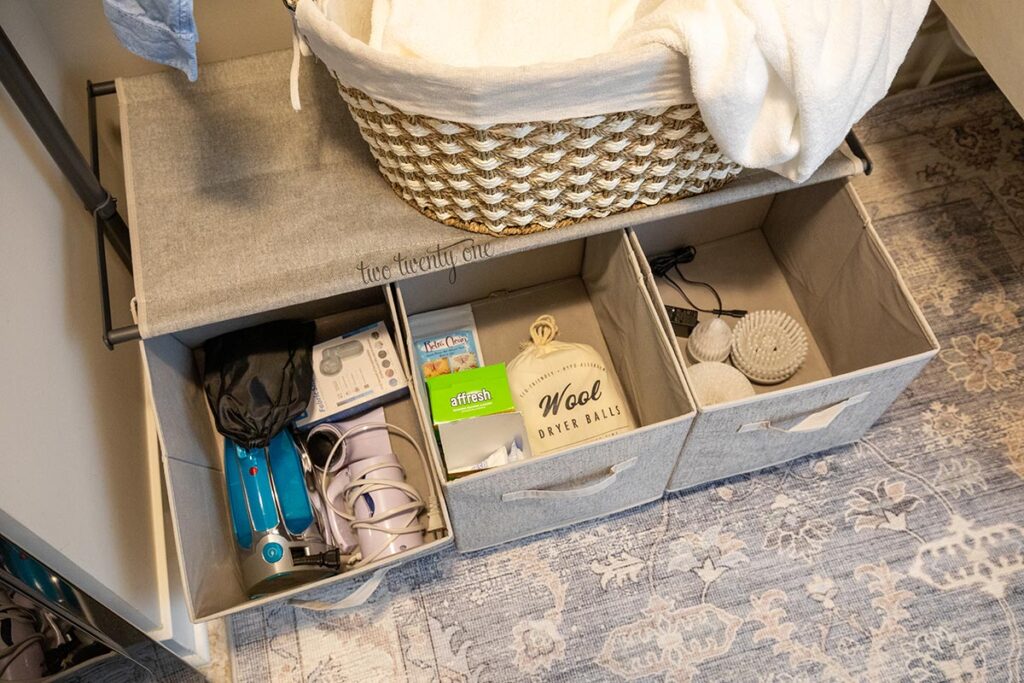 garment rack with three fabric drawers for built-in storage 