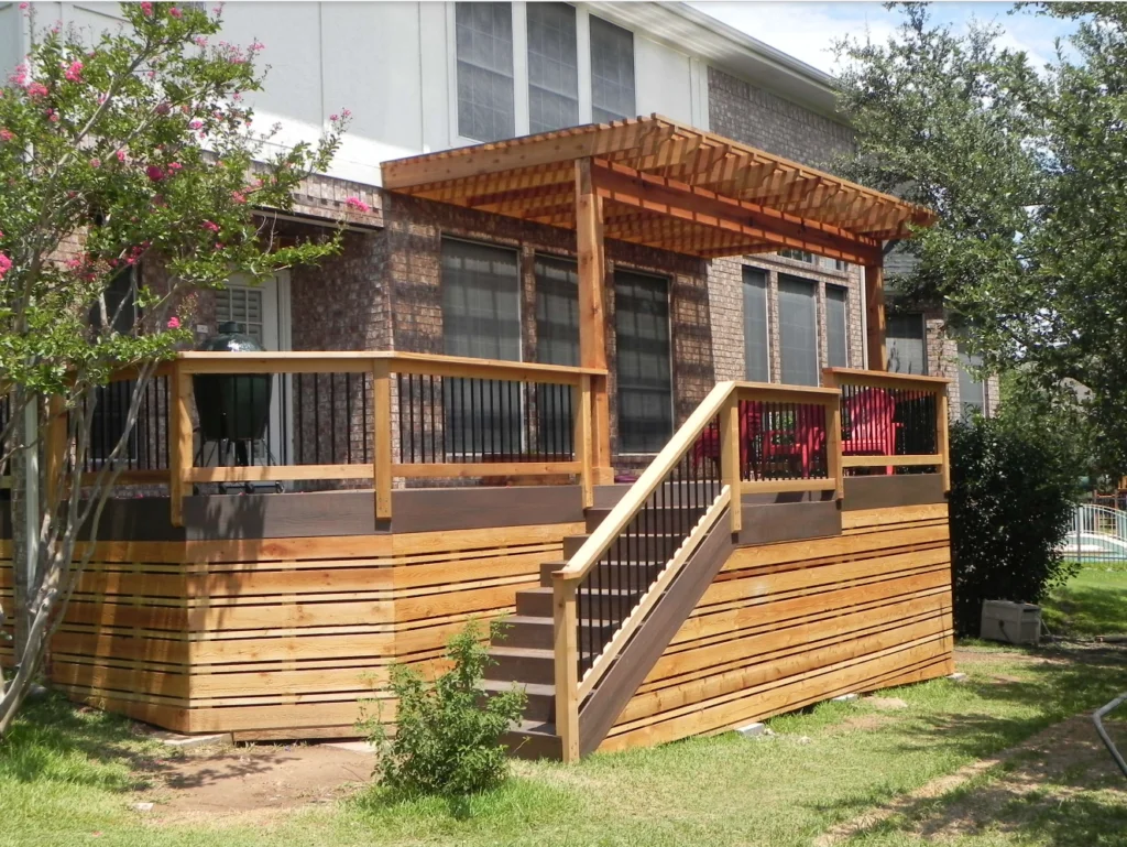 Horizontal wood slat deck skirting with wood pergola on top