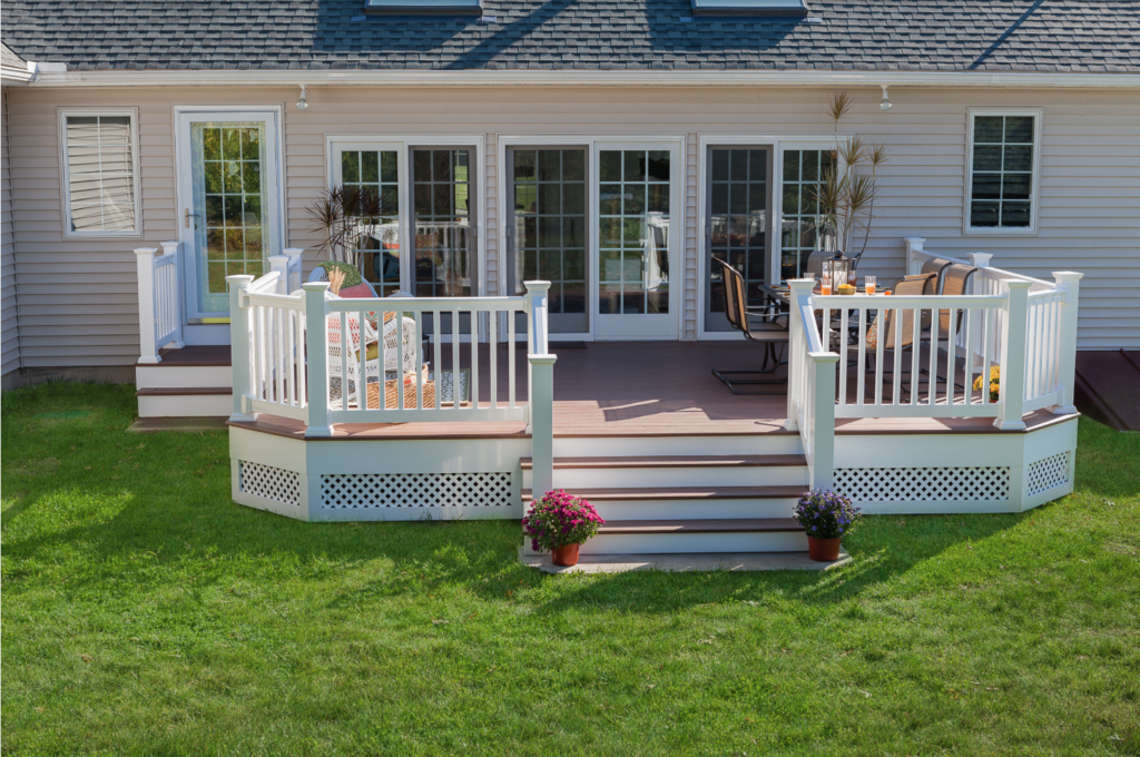 Deck with white railing and white diamond lattice skirting