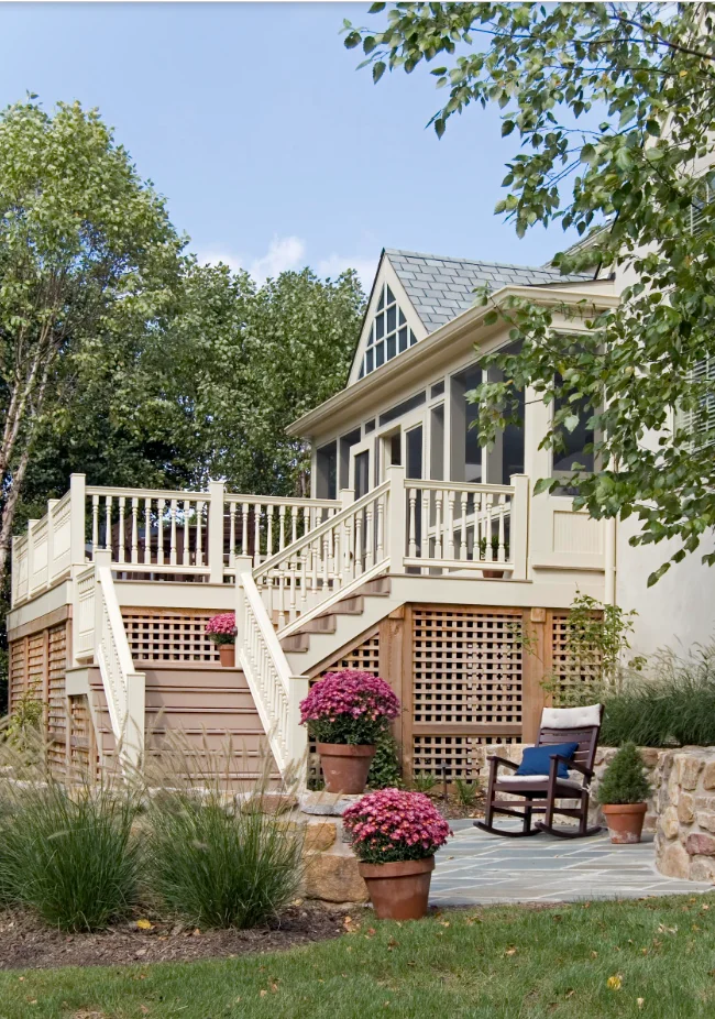 Deck with white railings and square wood lattice skirting